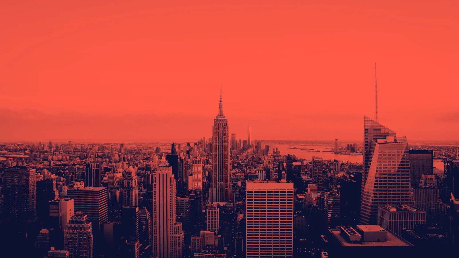Coral-on-ink duotone photograph of the New York skyline, the host city of Interchange New York 2026.